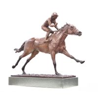 Frankie Dettori Rides Another Winner. Bronze mounted on green slate.